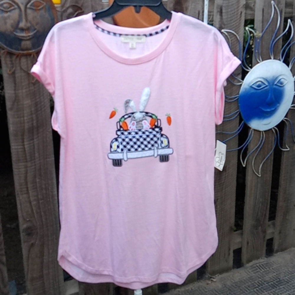 Woman's Pink blouse new with tags. Good stretch. Size m.